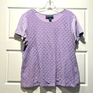 Light purple top. Textured detailed front. T-shirt back.